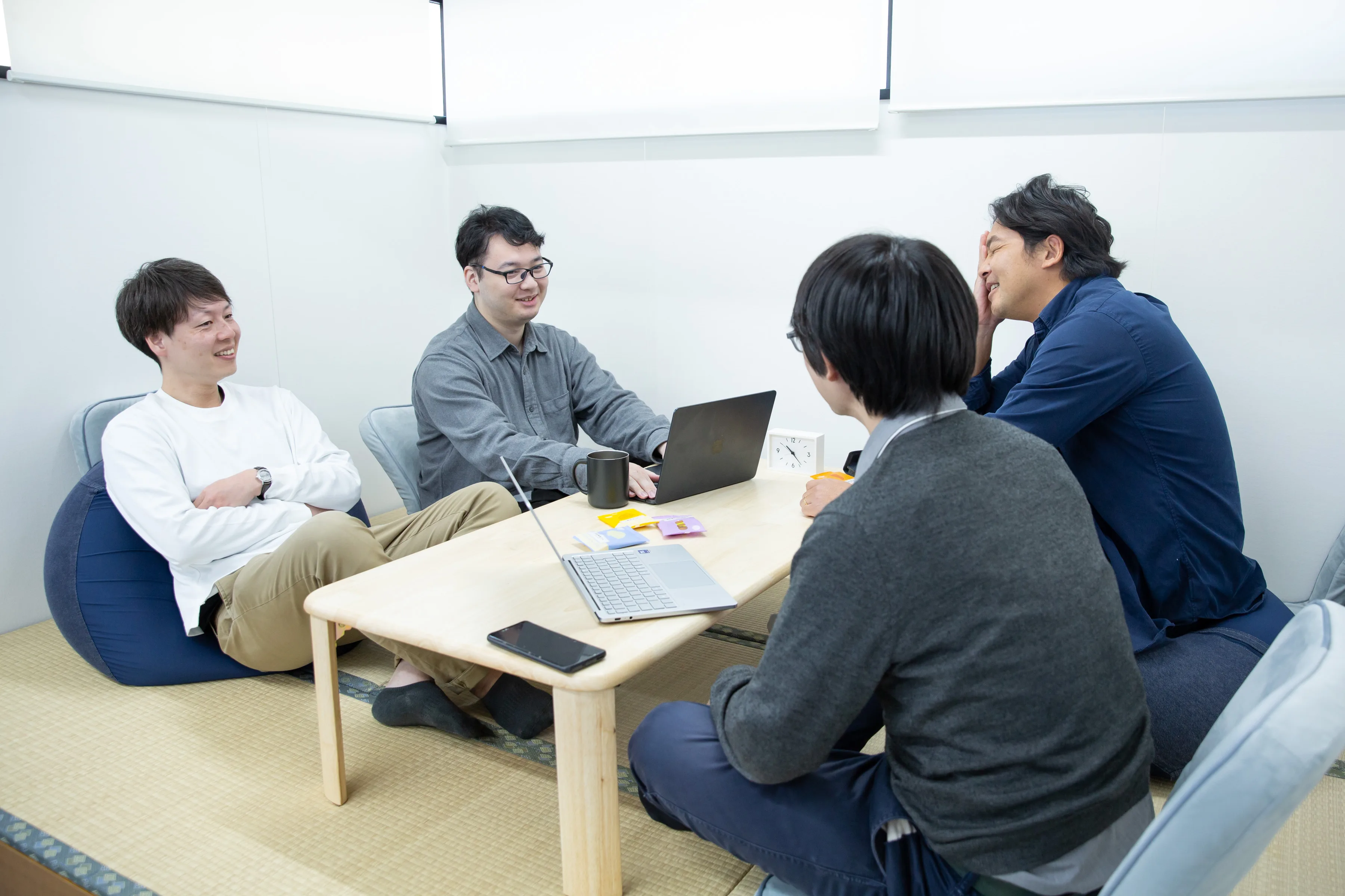 SENSEKAI team members in conversation